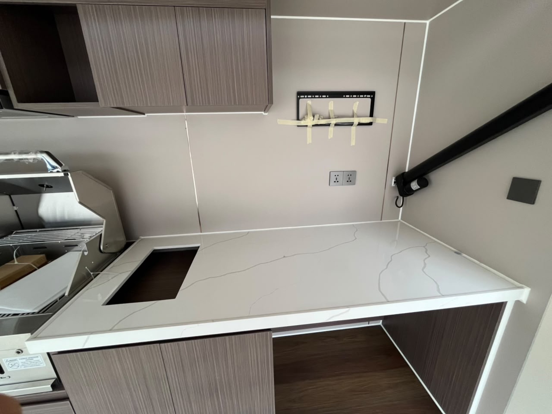 Custom outdoor kitchen interior with wood cabinetry